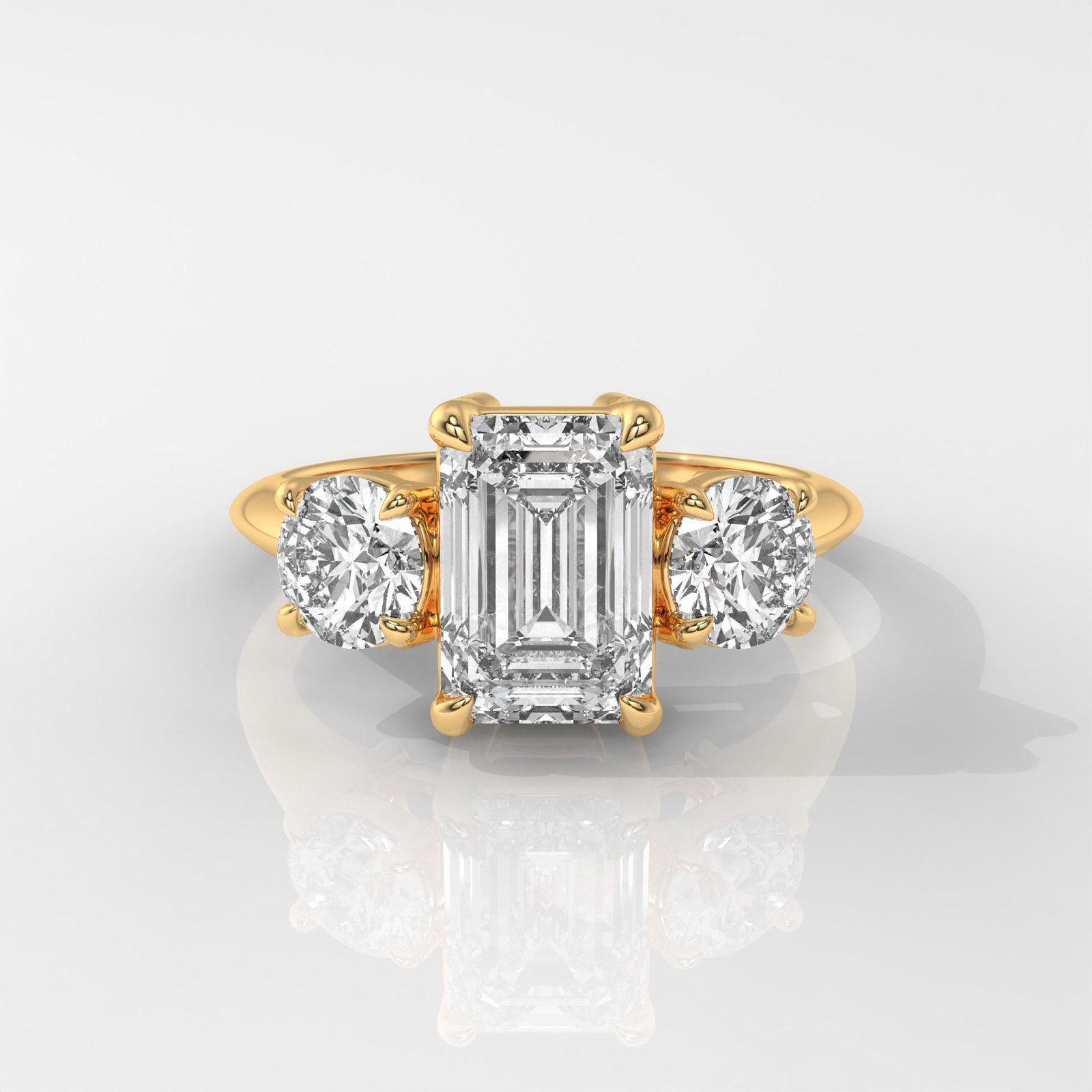Emerald Cut Enagement Ring with Round Side Stones