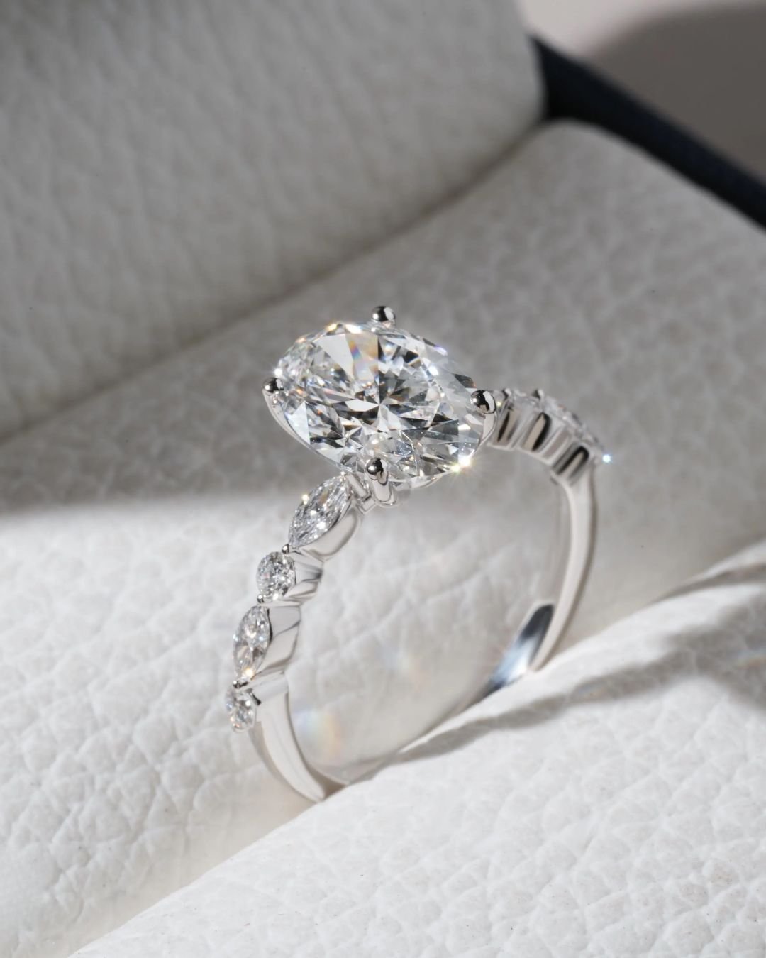 Oval Solitaire Engagement Ring With Side Stones