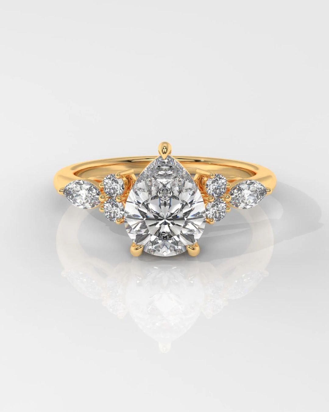 Pear Cut Diamond Engagement Ring With Side Stones