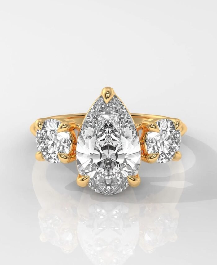 Pear Cut Three Stone Diamond Engagement Ring