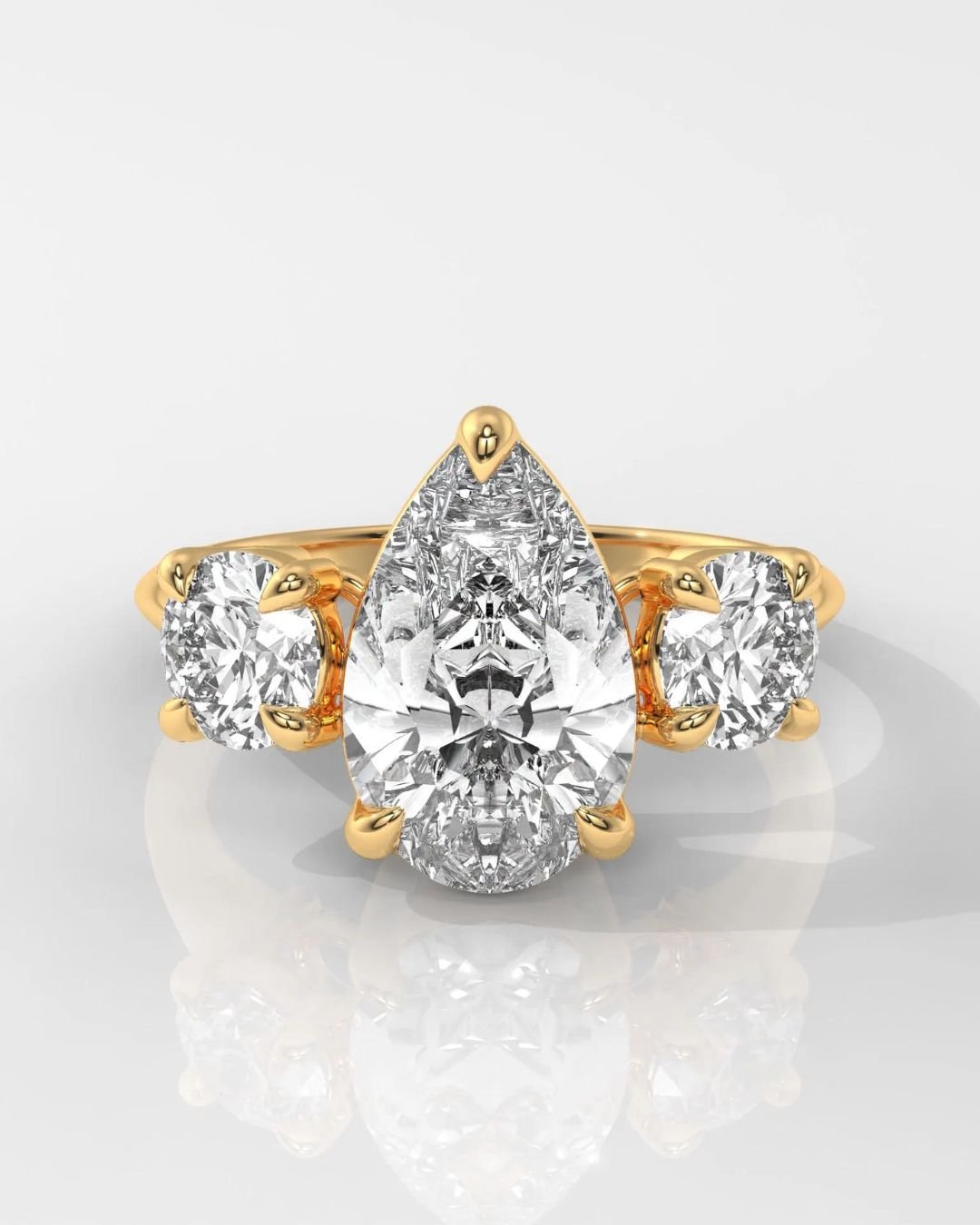 Pear Cut Three Stone Diamond Engagement Ring